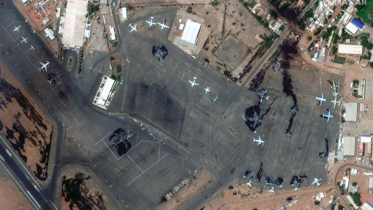 Satellite image of Khartoum airport showing several burned aircraft, April 2023