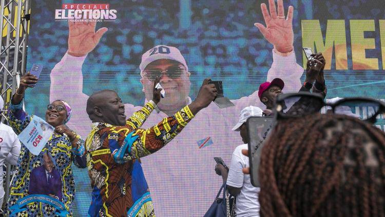 Supporters of Felix Tshisekedi celebrate following the announcement of election results in Kinshasa, on December 31, 2023. 
