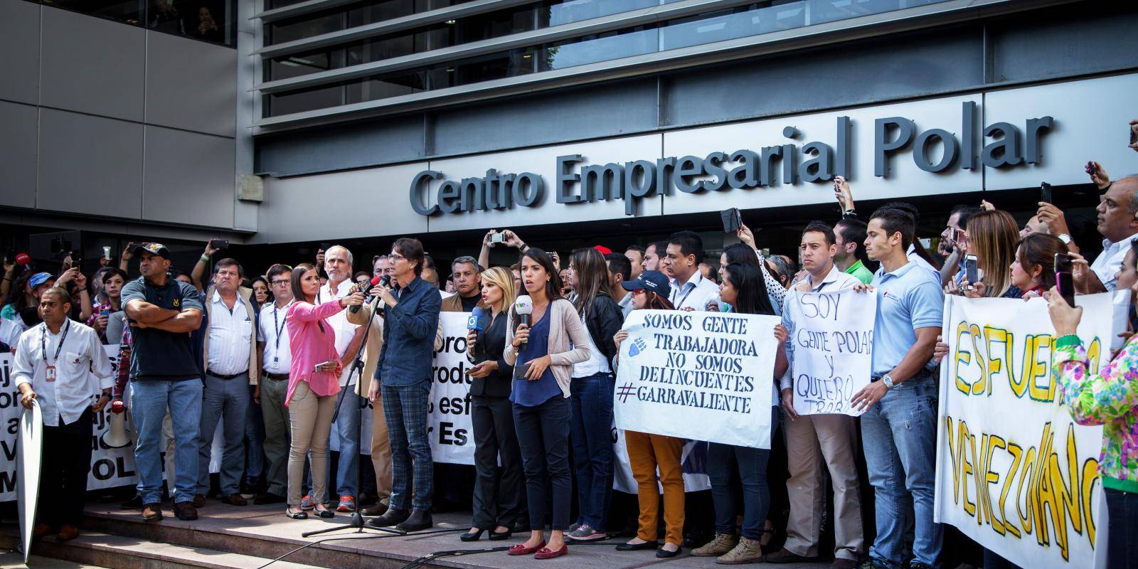 Protestors outside Empresas Polar in Venezuela