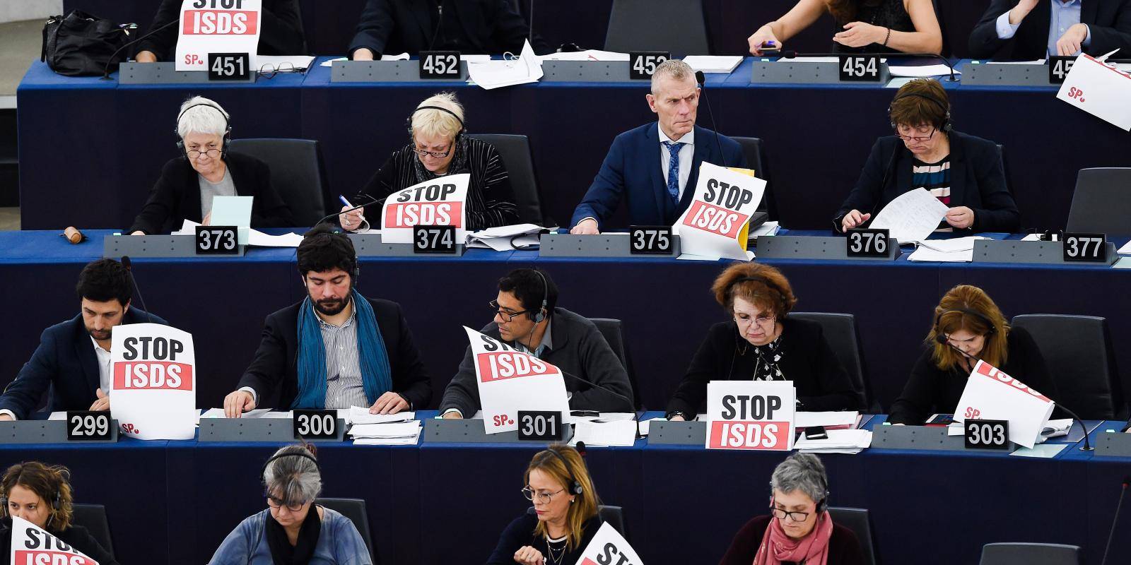 Members of the European Parliament hold panels reading ‘Stop ISDS’ at the European Parliament in Strasbourg 