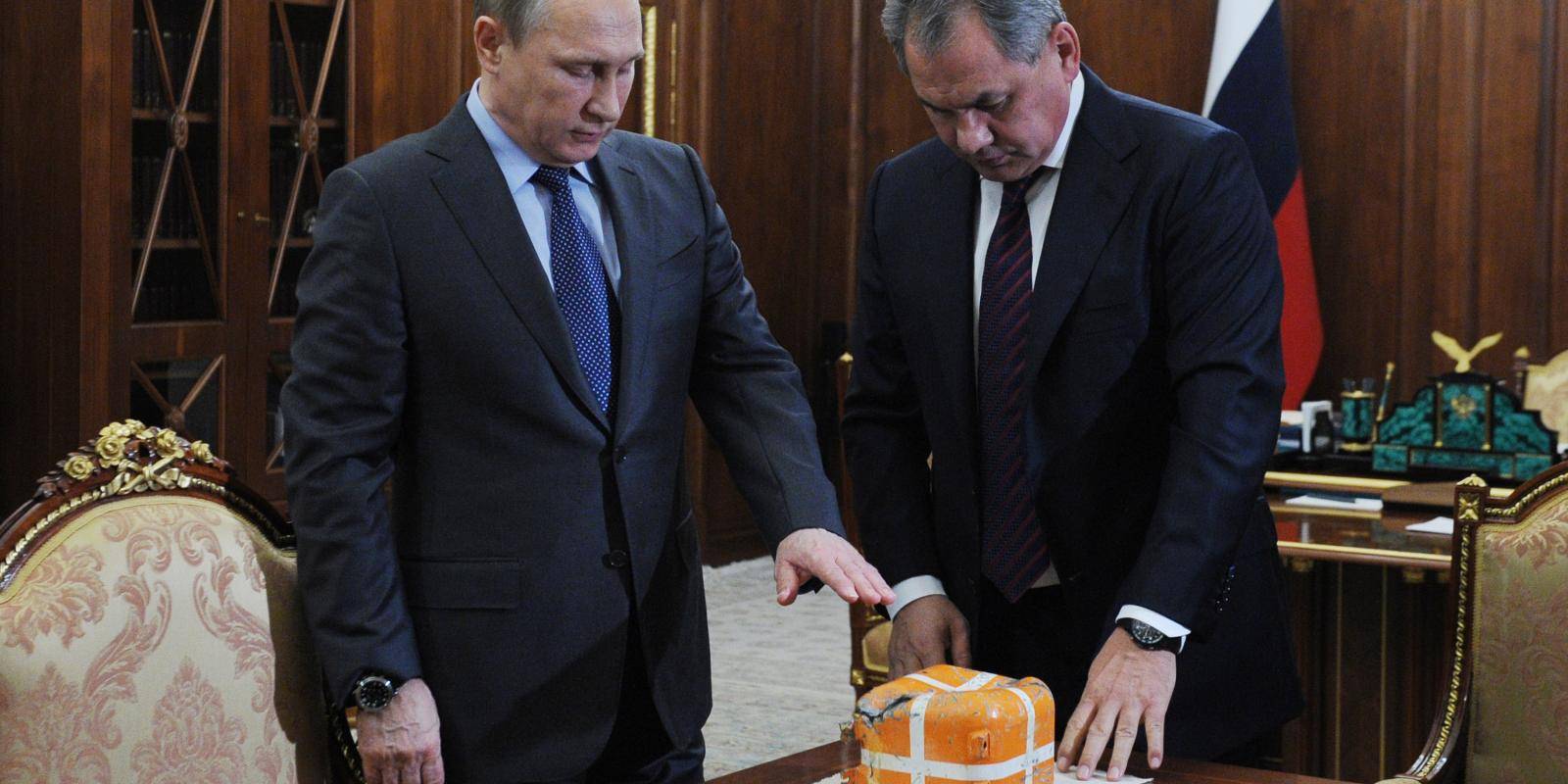 President Putin and Defence Minister Sergey Shoygu view flight data recorder from Russian jet shot down in Turkish airspace in November 2015