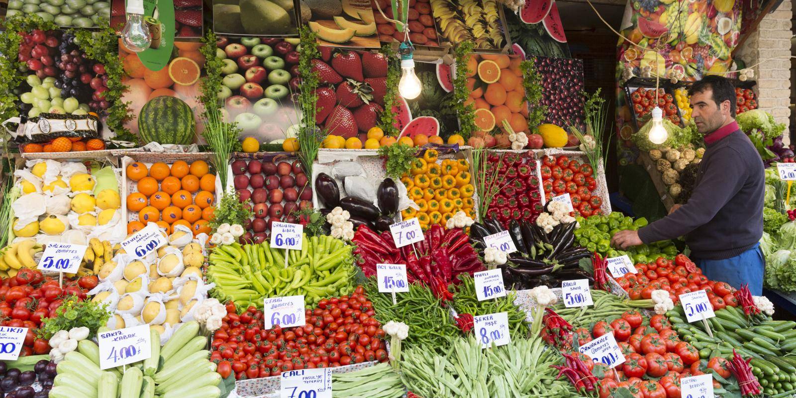A market stall displaying a variety of fresh produce