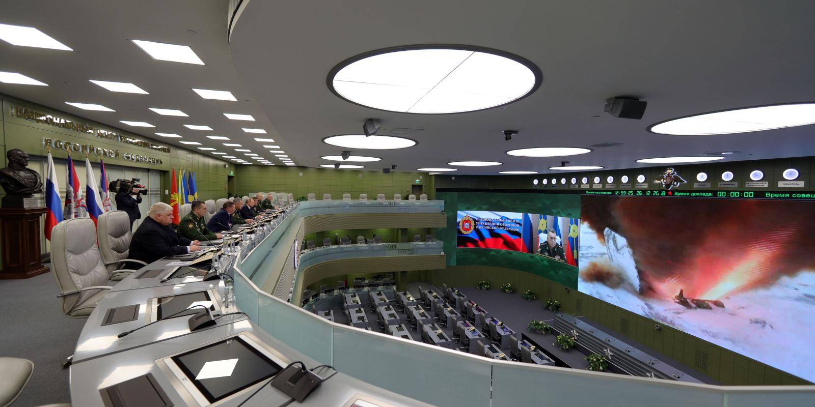 Russian president Vladimir Putin visits the national defence control centre in Moscow to oversee the test launch of the Avangard hypersonic missile in December 2018. Photo by MIKHAIL KLIMENTYEV/SPUTNIK/AFP via Getty Images.