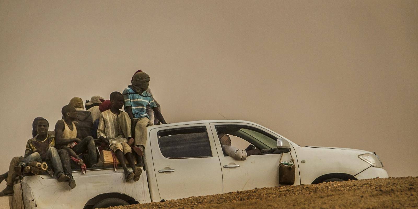 Migrants travel on a truck in Agadez, Niger.