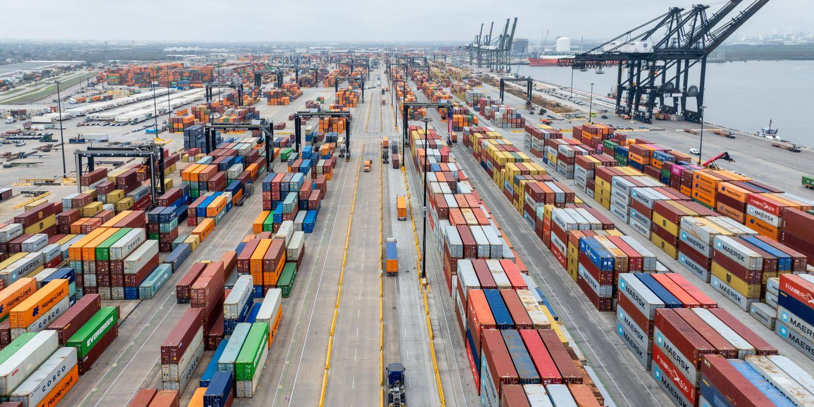 Global port operations and trade tariffs impacting international commerce