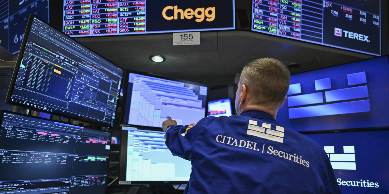 A trader works on the floor of the New York Stock Exchange.
