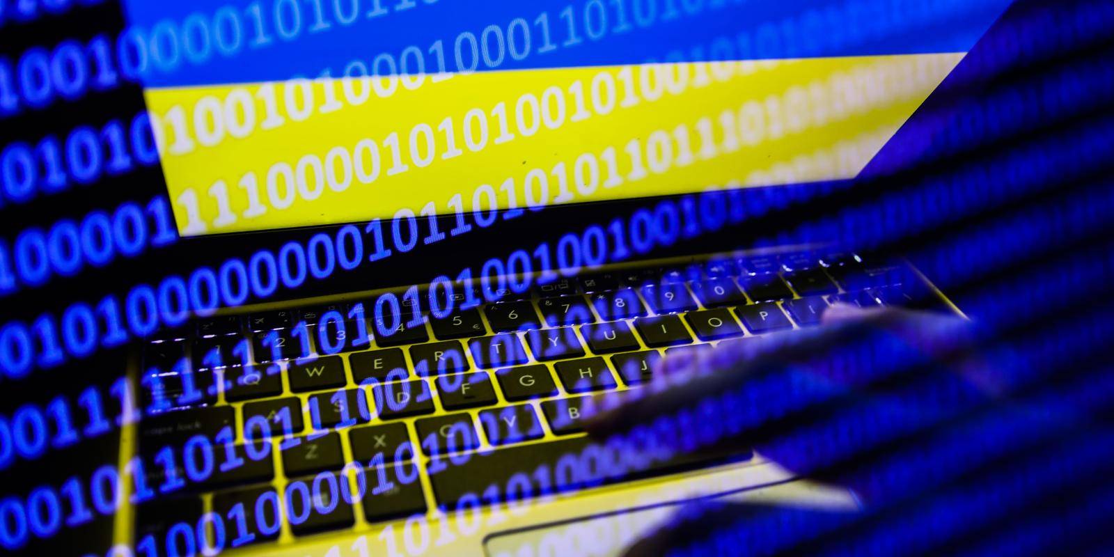 Image of laptop screen with Ukrainian flag and binary code