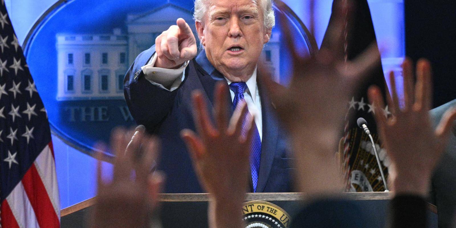 Photo of President Donald Trump pointing at a press conference