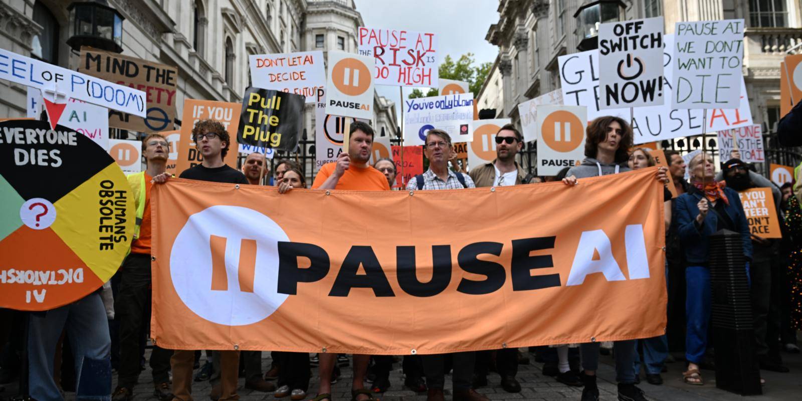 Photo of protesters calling for a pause in AI development
