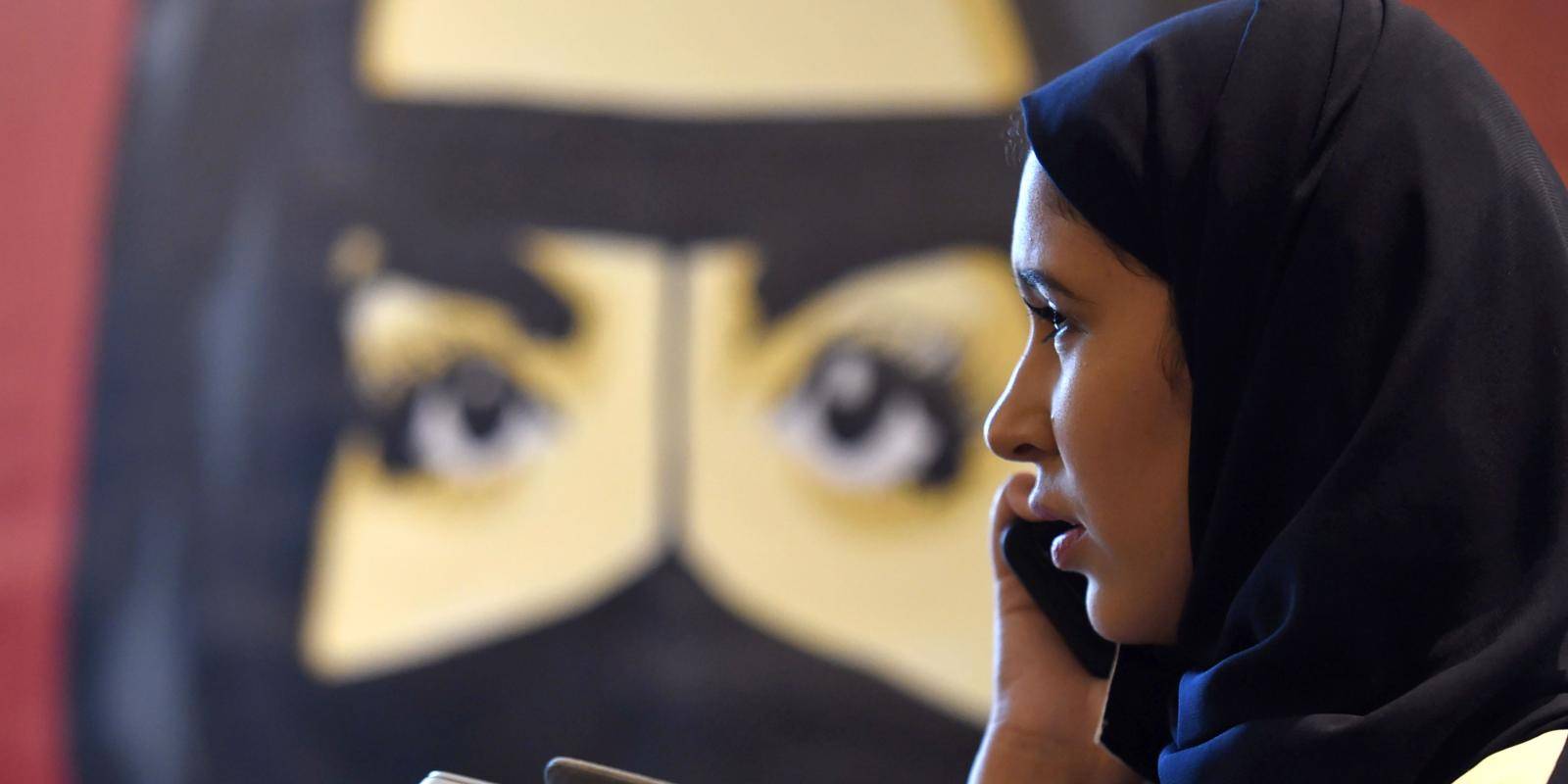 A Saudi woman talks on her phone during the ‘MiSK Global Forum’, held in Riyadh under the slogan ‘Meeting the Challenge of Change’, on 15 November 2017. Photo: Fayez Nureldine/AFP/Getty Images.