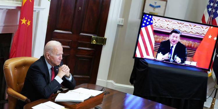US President Joe Biden meets with China's President Xi Jinping during a virtual summit in 2021.