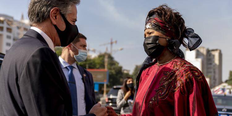 US Secretary of State Antony Blinken fist bumps Senegalese Foreign Minister Aissata Tall Sall as he leaves their joint news conference in Dakar.