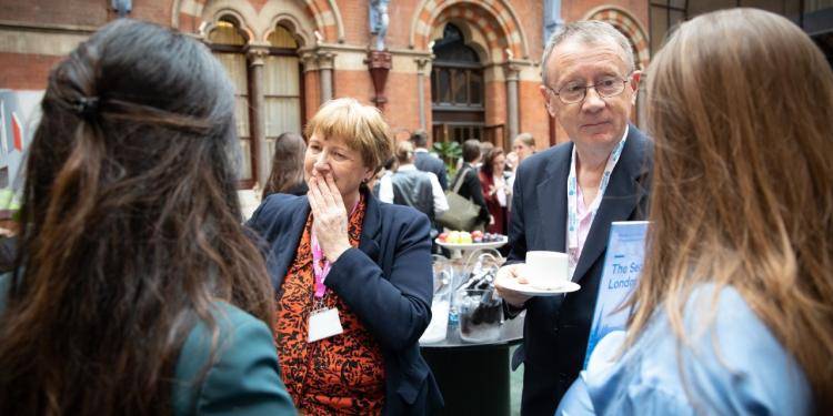 Networking at the London Conference. Photo by Suzanne Plunkett