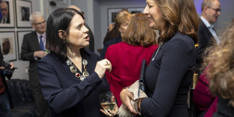 Bronwen Maddox and Dr Leslie Vinjamuri talking to each other at an event.