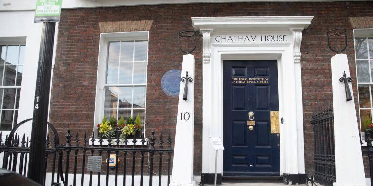 Chatham House exterior with the iconic blue door and the blue plaque.