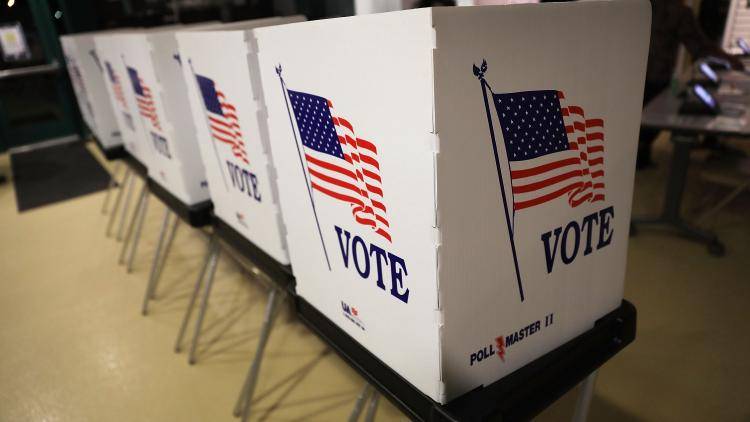 Voting booths are set up in Tampa, Florida for early voters on 22 October 2018. Photo: Getty Images
