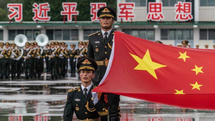 The People’s Liberation Army attend a flag raising ceremony on 30 June 2018 in Hong Kong