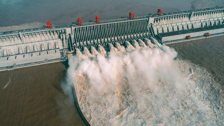 water being released from the Three Gorges Dam, a gigantic hydropower project on the Yangtze river, in Yichang, central China's Hubei province. 