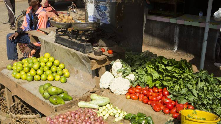 Vendors sell produce in the market, in Antsirabe, Madagascar.