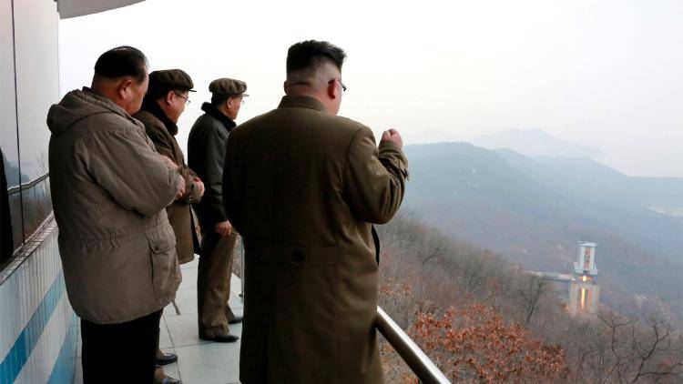 Kim Jong-un, the North Korean leader, watches the ground jet test of a newly developed high-thrust rocket engine at the Sohae Satellite Launching Ground.