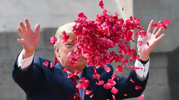Donald Trump throwing rose petals