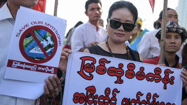 A crowd protests against the Myit Sone Dam project in Yangon, Myanmar