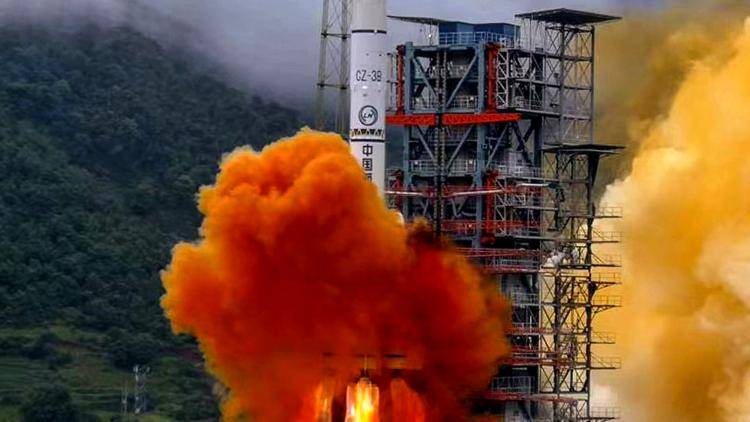 A Long March 3B rocket lifts off from Xichang Satellite launch station in Sichuan province carrying a BeiDou-3GEO3 satellite into orbit