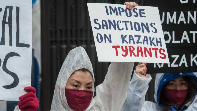 Activists and Kazakhstani diaspora protest against human rights violations in Kazakhstan outside the country's embassy in London, England. Photo by Guy Smallman/Getty images.