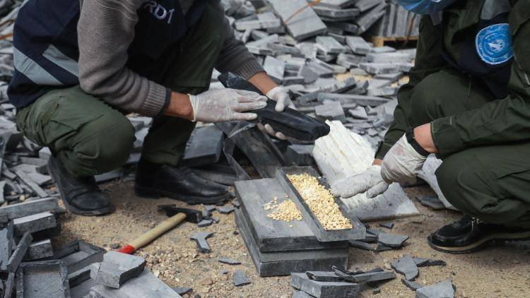 Kurdish police in Qamishli, a city on the Syrian-Turkish border, find a stash of captagon tablets hidden in building materials