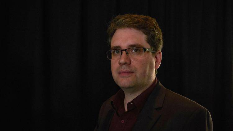 Headshot of Eliot Hggins,The founder of the open-source intelligence outlet Bellingcat. 