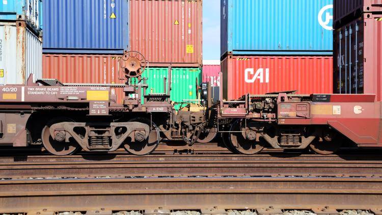 Container cars pulled by Union Pacific locomotives at the Port of Los Angeles, California, US.