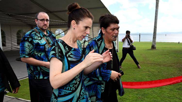 New Zealand Prime Minister Jacinda Ardern speaks as Foreign Minister Nanaia Mahuta leave a press conference at the Pacific Islands Forum in Suva, Fiji on 13 July 2022.