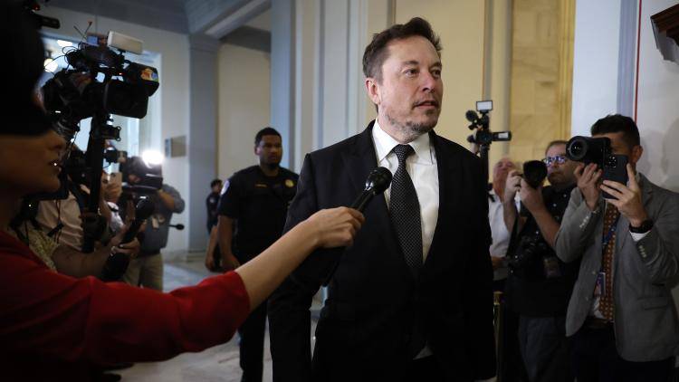 Elon Musk arrives at the AI Insight Forum in September 2023