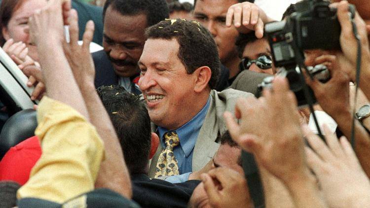 Hugo Chavez in crowd of supporters having just cast his vote on 6 December 1998 in Venezuela presidential election