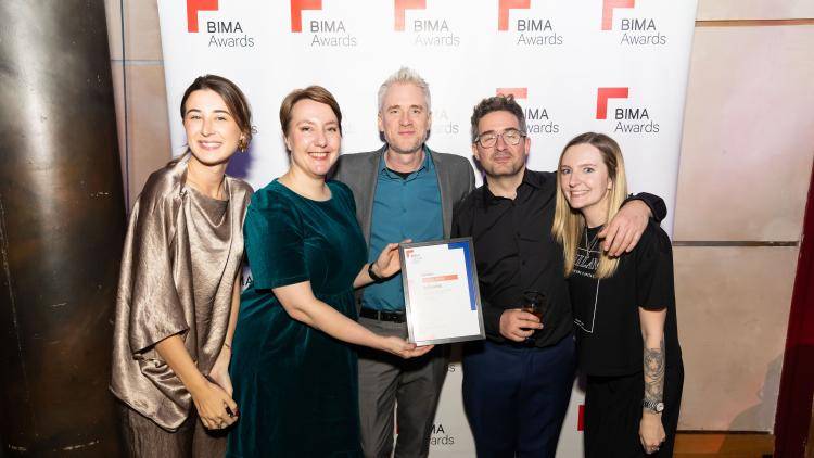 The Chatham House Security Programme staff pictured with their prize at the BIMA Awards 