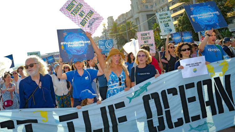 Protesters at the UN Ocean Conference.