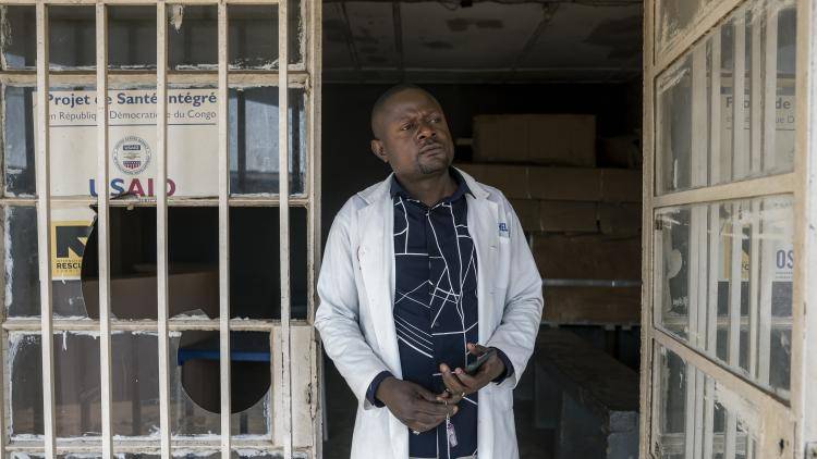 A doctor stands at the door of the Manika health center in the town of Kolwezi, Lualaba province, Democratic Republic of Congo, 2 August 2025