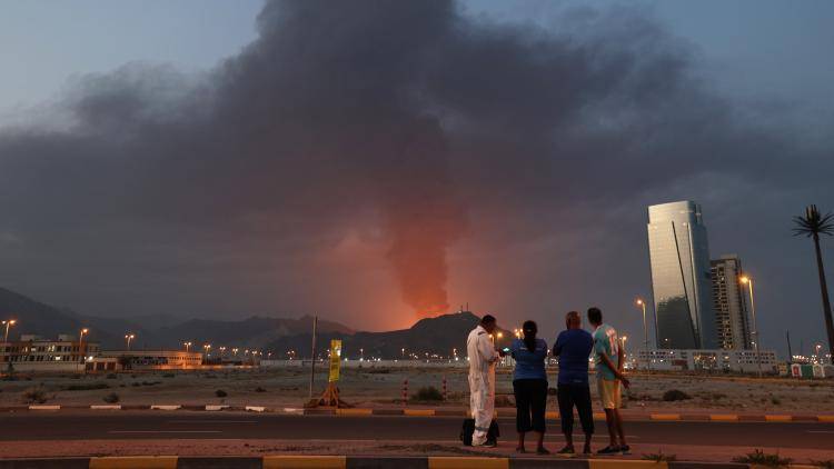 smoke rises in an industrial zone of the UAE