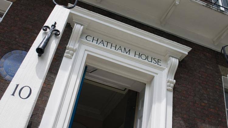 A photo of the Chatham House entrace with the door open.