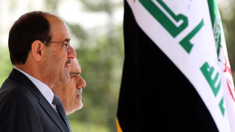 Iraq's Nouri al-Maliki with the Iranian Vice-President Mohammad Reza Rahimi. Photo: Atta Kenare/AFP/Getty Images