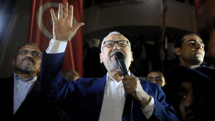 Rached Ghannouchi addresses an Ennahdha rally in Tunis