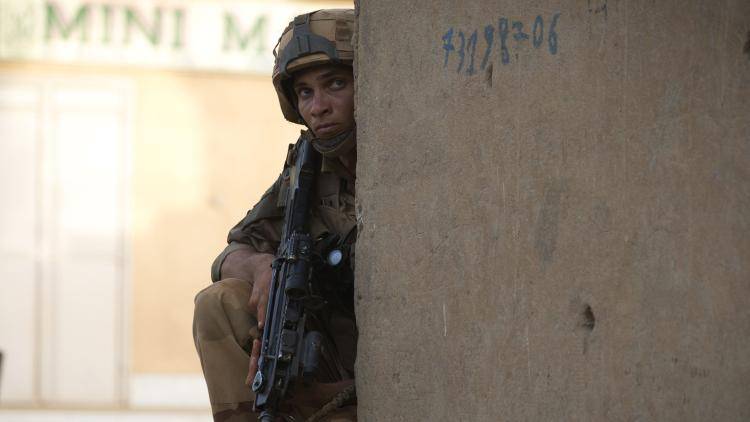 A French soldier patrols in the street in Gao after the city was recaptured by French and Malian forces earlier this year. Photo: Joel Saget/AFP/Getty Images