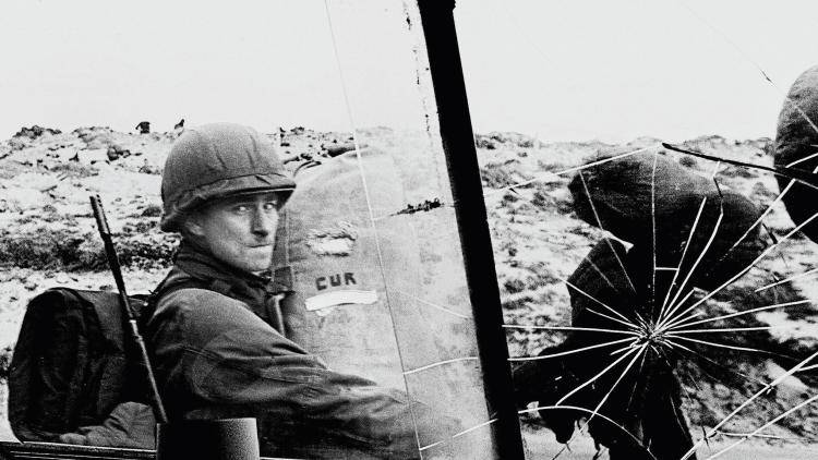 Argentine soldiers on their way to occupy the Royal Marines base in Port Stanley. Photo: Daniel Garcia/AFP/Getty Images