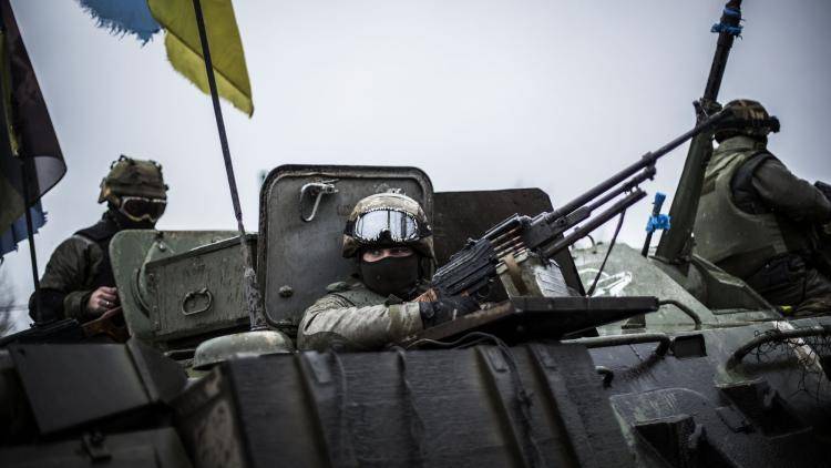 A Ukrainian soldier in an armoured vehicle near the city of Artemivsk. Photo: AFP/Getty Images