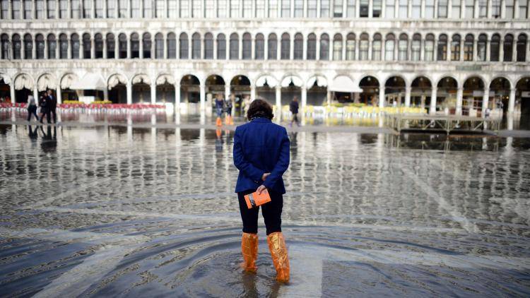 Paddling across St Mark's Square will soon be a thing of the past. Photo: Olivier Morin/AFP/Getty