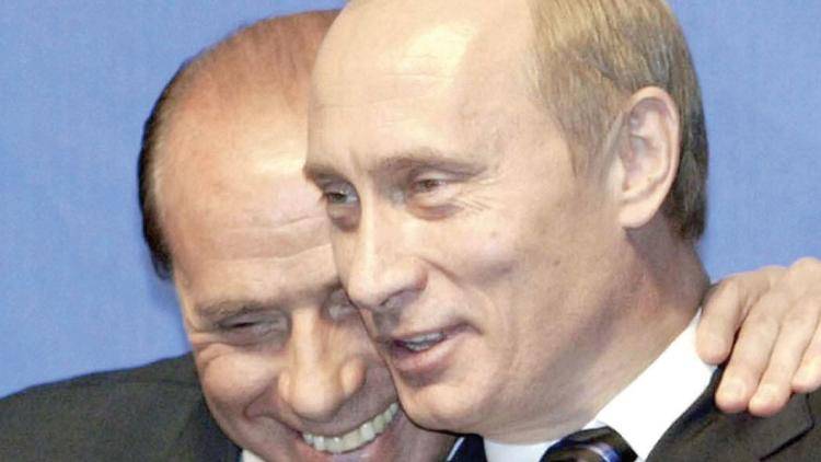 Keep it clean, Silvio: Vladimir Putin with Italy’s former prime minister. Photo: Maxim Marmur/AFP/Getty