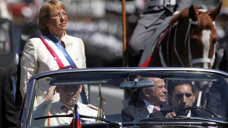 Michelle Bachelet takes part in a ceremonial parade following her inauguration on 11 March 2006 outside the Congress in Valparaiso, Chile. Michelle Bachelet was sworn in as Chile's first woman president in the history of the socially conservative country. Photo: Getty Images. 