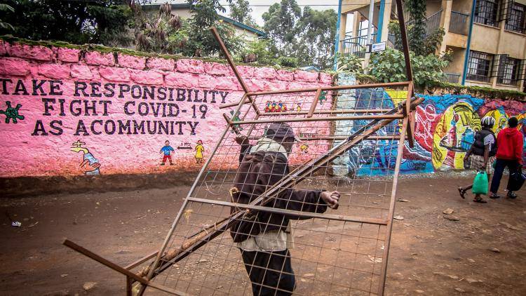 A wall with an awareness graffiti in Kibera slums, Kenya