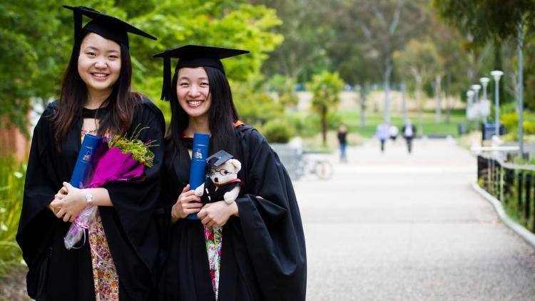 Young Chinese students graduating from Australian National University