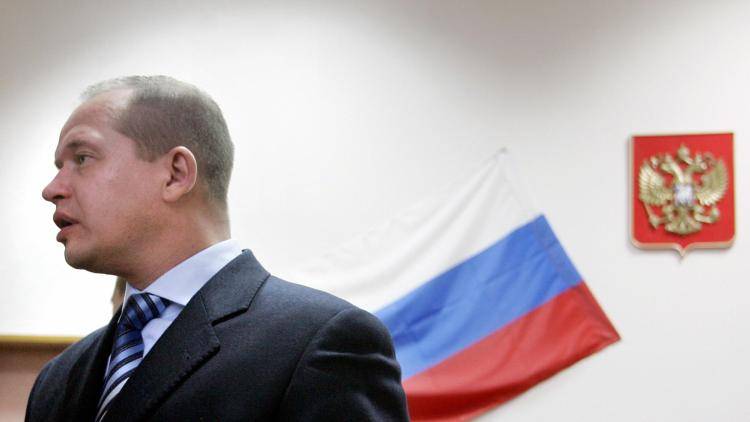 Sergei Brovchenko, former KGB agent turned lawyer and human rights activist stands in the court room during his trial in Moscow